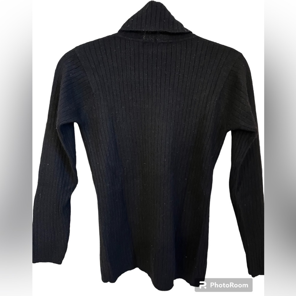Black turtleneck, size small. 50% lamb wool, 30% nylon, 15% angora